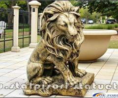 Statuetă leu în șezut, auriu patinat, model S46.